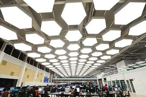 Office open space with acoustic luminous stretch ceiling